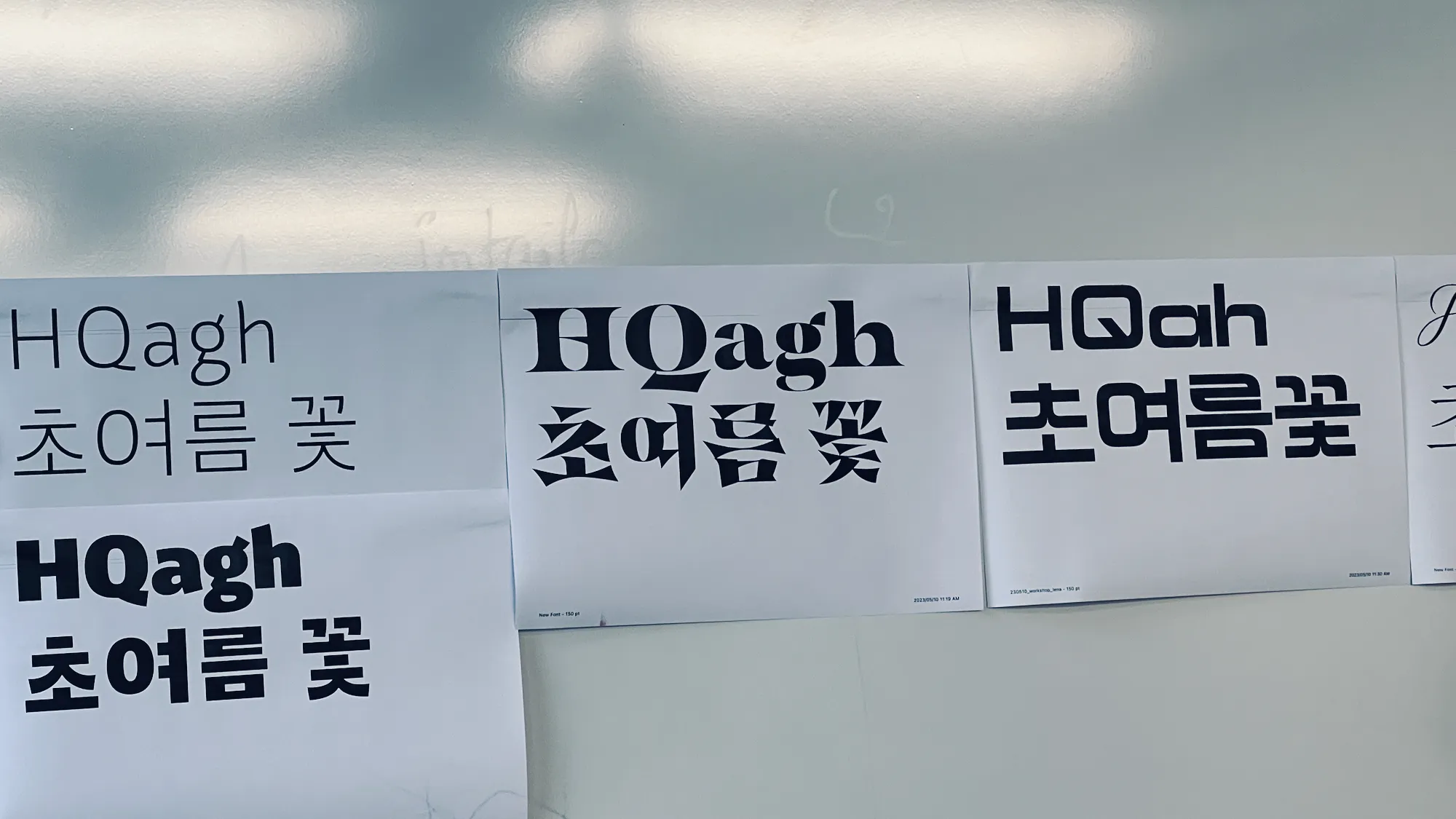 ハングルワークショップ、真ん中が自分のもの。Narukamiを元にし、左2つはうまくいったものの複雑なグリフは難しい